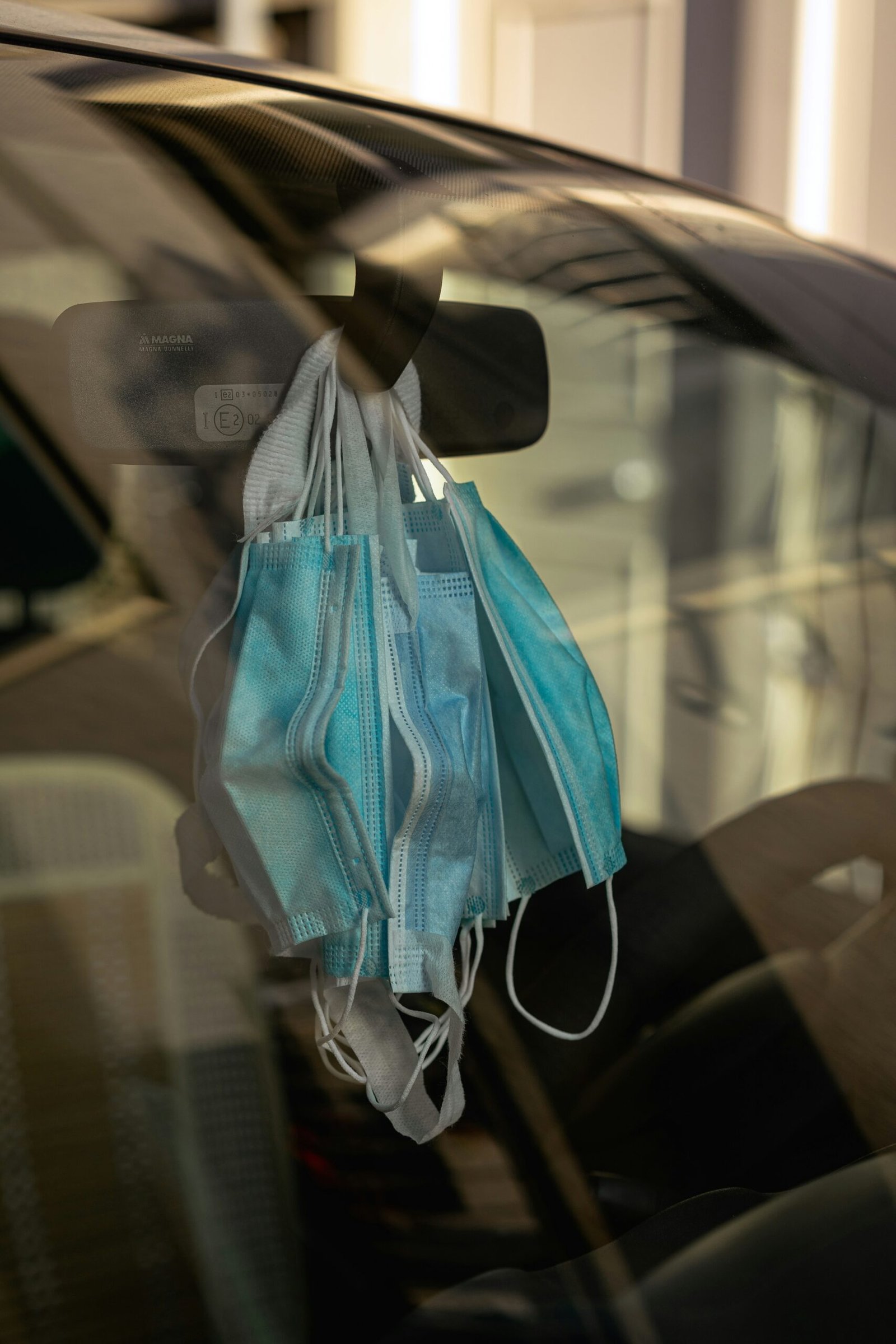 blue and black backpack on black leather seat